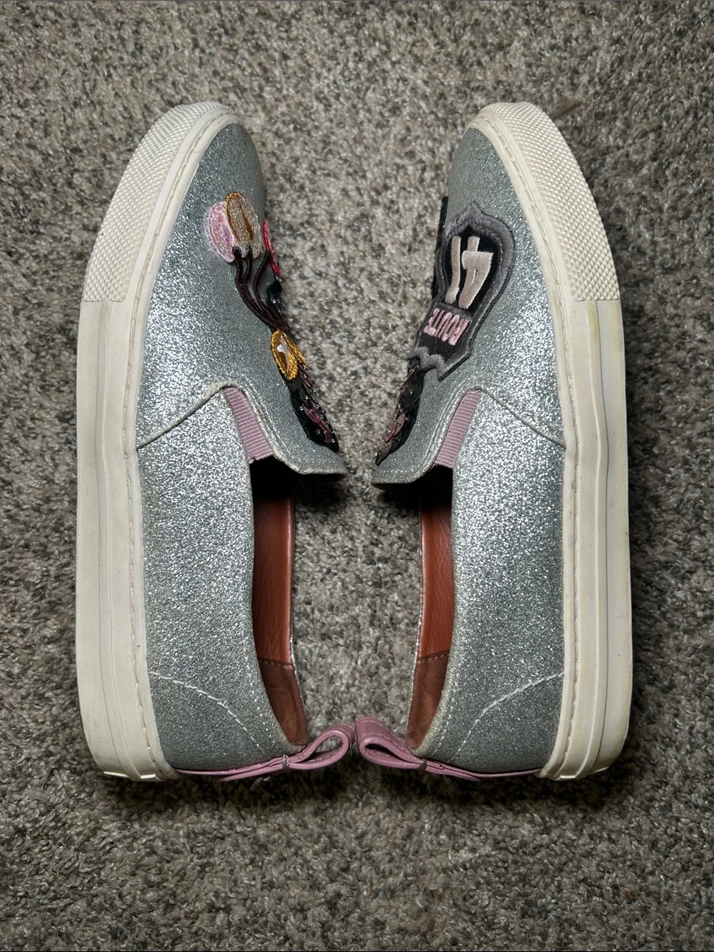 Coach C115 sneakers with a silver glitter‎ finish and Route 41 patches. Size 8